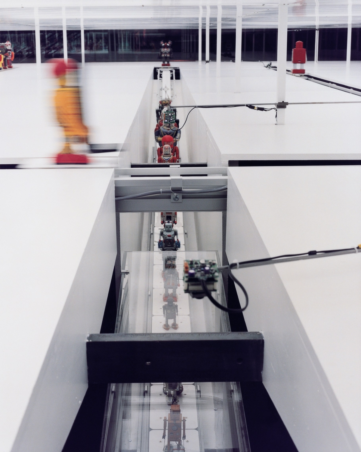 Master/Slave — Robots on 300' conveyer belt